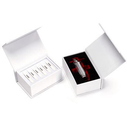 Professional aesthetic treatment handpiece with multiple interchangeable attachments in storage boxes